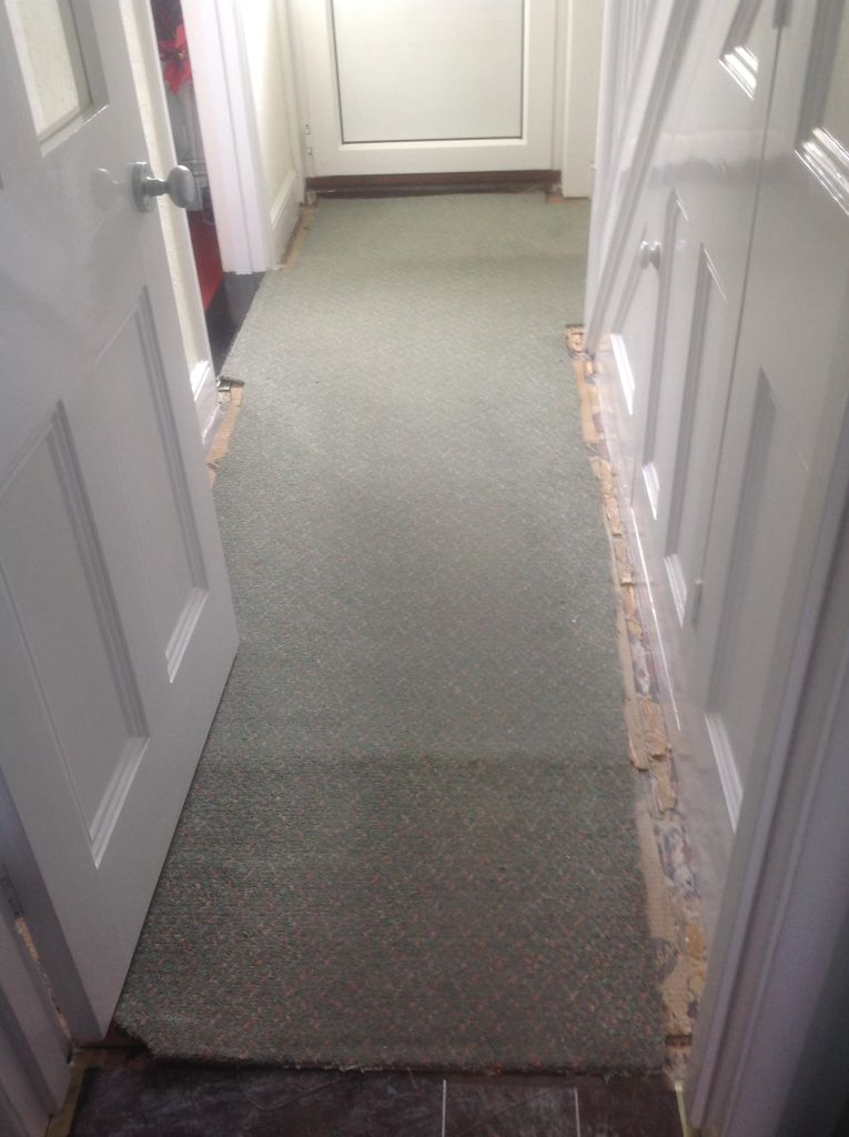 Edwardian Tiled Hallway Covered in Carpet and Before Restoration in Chippenham