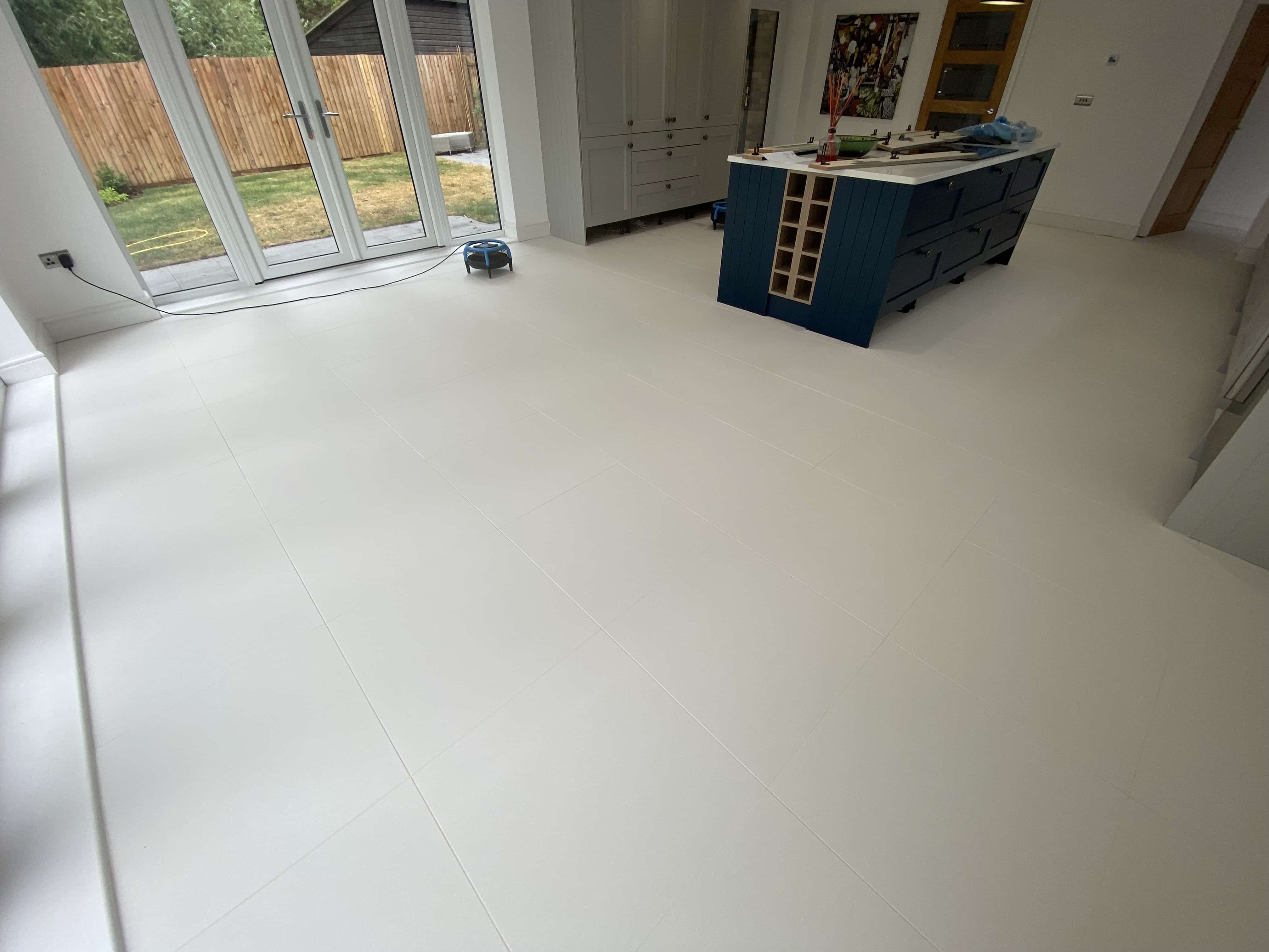 Pale Porcelain Tiled Kitchen Floor After Grout Haze Removal in Winwick Huntingdon